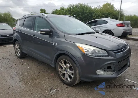 2016 Ford Escape Titanium z USA, uszkodzony, nr VIN 1FMCU0J91GUB06275